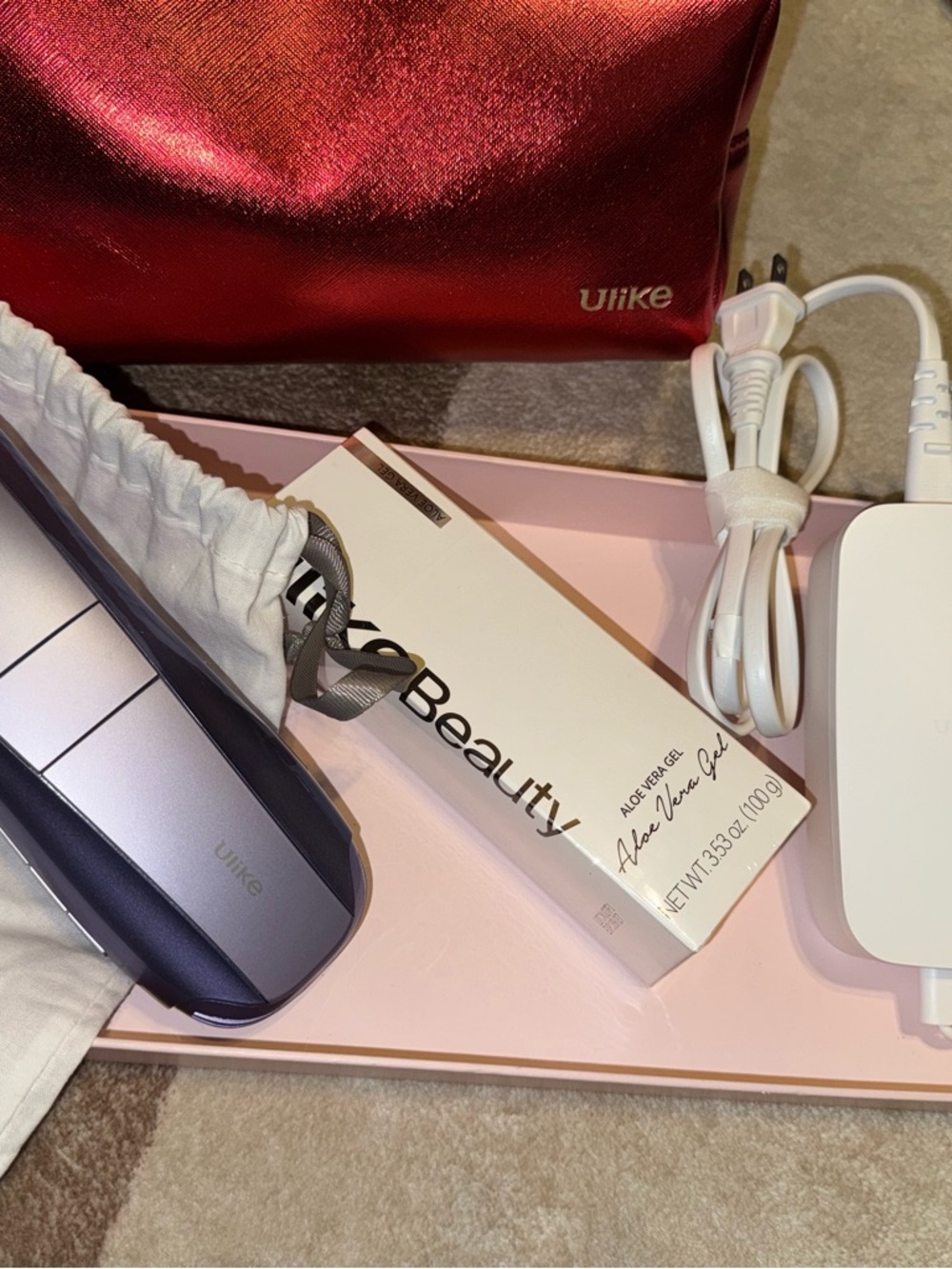 Ulike Purple Personal Hair Removal Device with Red Carrying Pouch